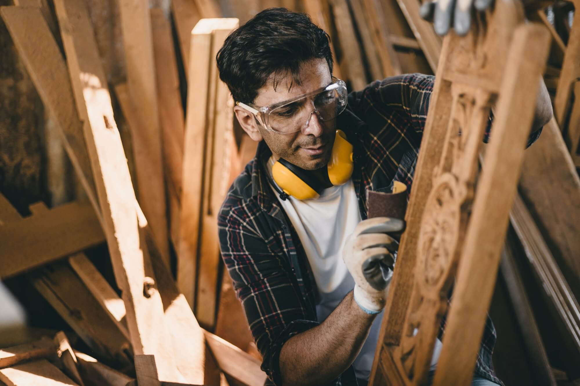 portrait-professional-carpenter-man-hand-working-make-wooden-handcraft-furniture-master-workpiece.jpg